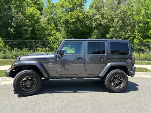 Used 2016 Jeep Wrangler Unlimited Sahara AWD/4WD image 1
