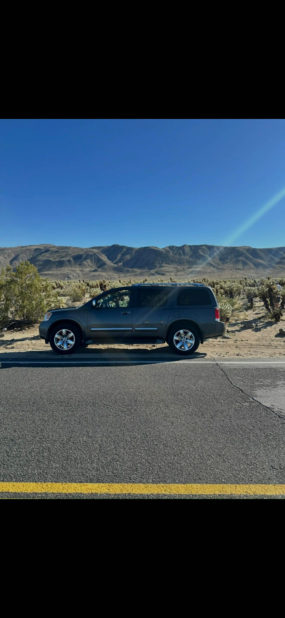 Used 2010 Nissan Armada Platinum w/ Captain Seat Pkg RWD image 2