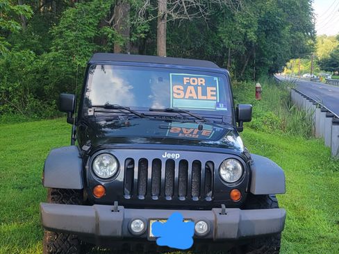 Used 2010 Jeep Wrangler Unlimited Sport image 1