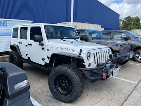 Used 2013 Jeep Wrangler Unlimited Rubicon w/ Dual Top Group image 2