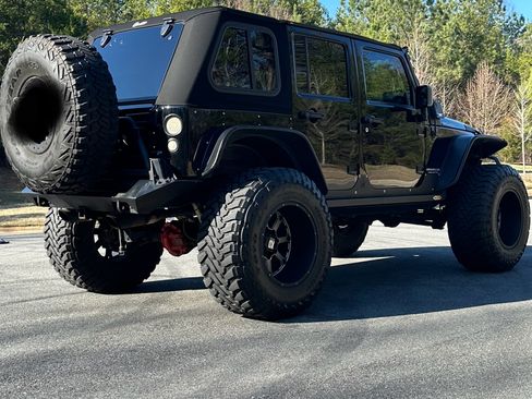 Used 2012 Jeep Wrangler Unlimited Rubicon w/ Dual Top Group image 4