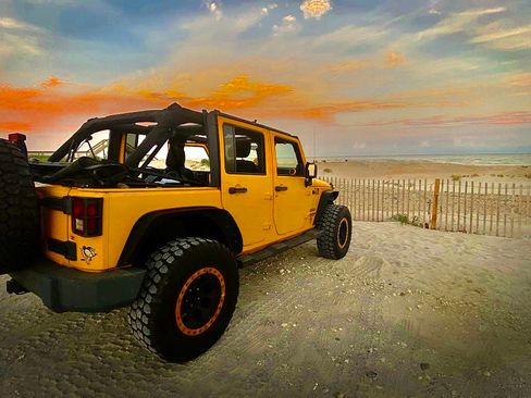 Used 2011 Jeep Wrangler Unlimited Sport AWD/4WD image 1