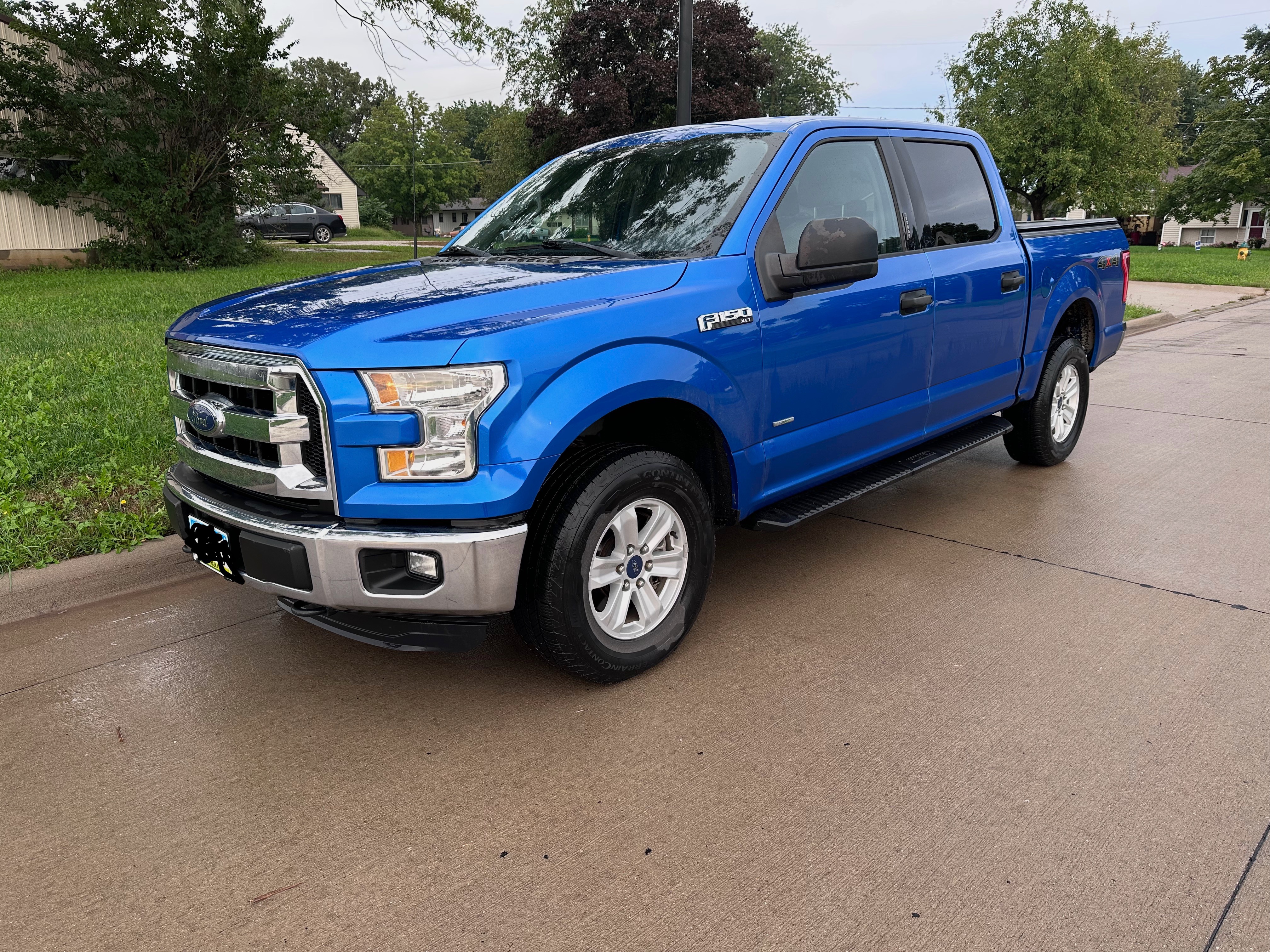 Used 2015 Ford F150 XLT AWD/4WD image 1