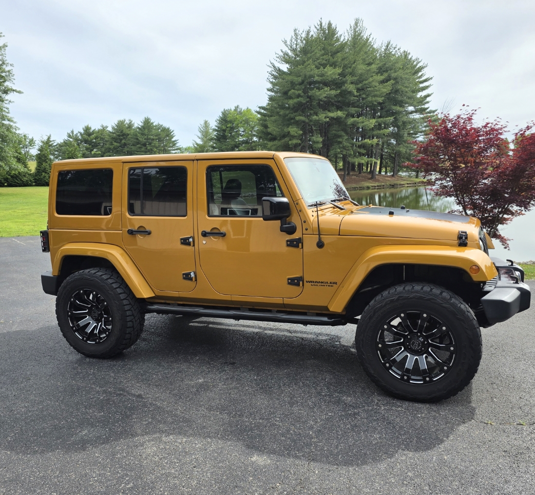Used 2014 Jeep Wrangler Unlimited Sahara AWD/4WD image 1
