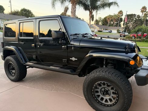 Used 2013 Jeep Wrangler Unlimited Sport image 1