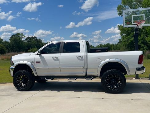 Used 2012 RAM 2500 Laramie w/ Protection Group AWD/4WD image 1