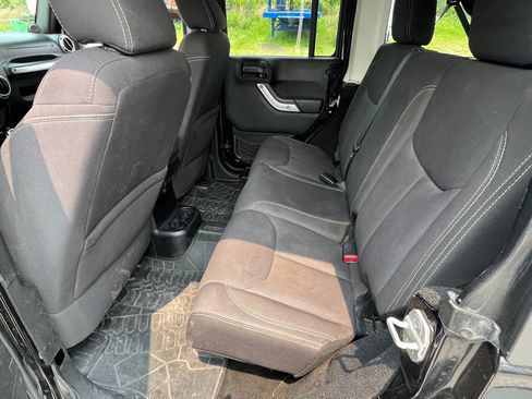 Used 2013 Jeep Wrangler Unlimited Sahara w/ Dual Top Group image 2