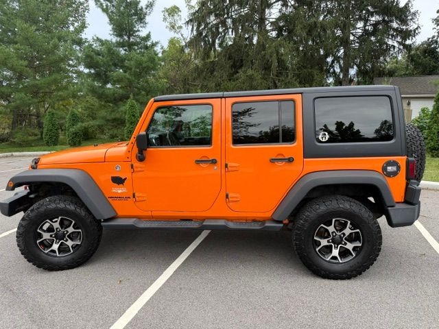 Used 2012 Jeep Wrangler Unlimited Sahara w/ Dual Top Group AWD/4WD image 13