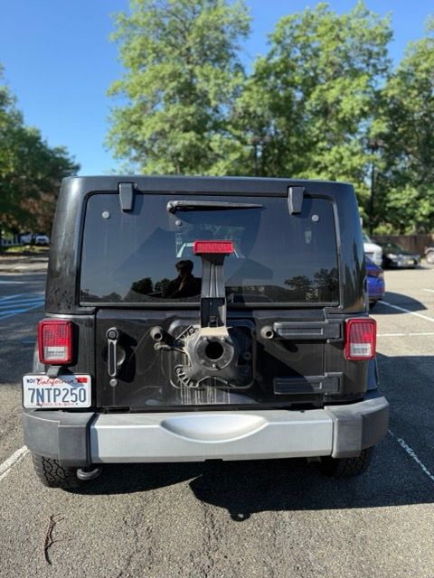 Used 2015 Jeep Wrangler Sahara w/ Connectivity Group AWD/4WD image 1