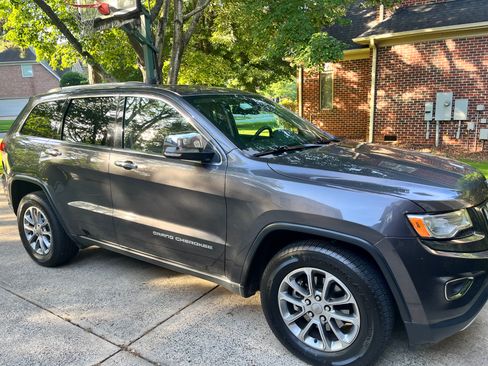 Used 2015 Jeep Grand Cherokee Limited w/ Luxury Group II RWD image 1