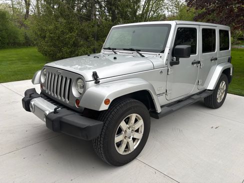 Used 2011 Jeep Wrangler Unlimited 70th Anniversary w/ Dual Top Group AWD/4WD image 2