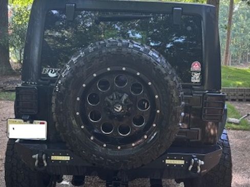 Used 2014 Jeep Wrangler Unlimited Sahara w/ Dual Top Group AWD/4WD image 5
