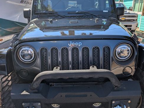 Used 2013 Jeep Wrangler Unlimited Sahara w/ Dual Top Group image 2