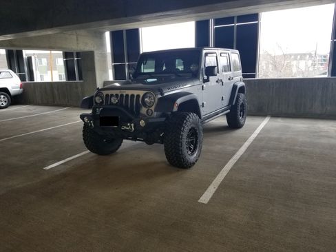 Used 2015 Jeep Wrangler Unlimited Rubicon w/ Dual Top Group AWD/4WD image 1