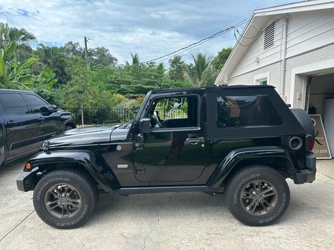 Used 2016 Jeep Wrangler Sahara AWD/4WD image 1