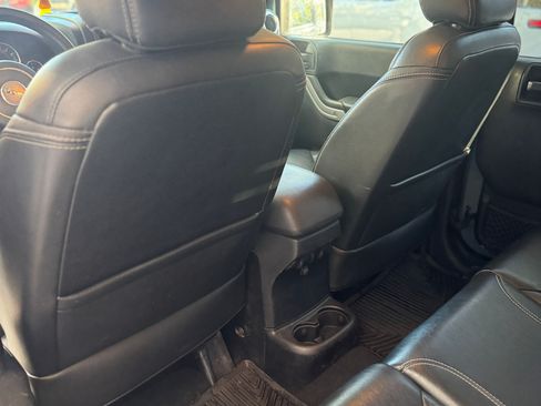 Used 2014 Jeep Wrangler Unlimited Sahara w/ Dual Top Group image 11