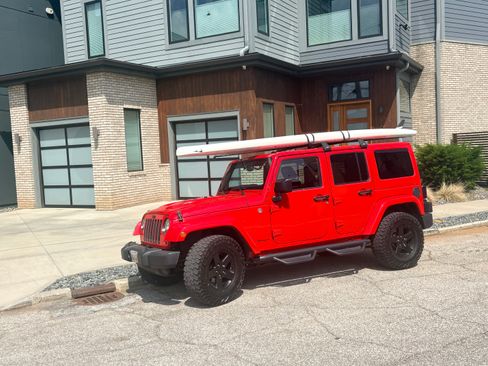 Used 2015 Jeep Wrangler Unlimited Sahara AWD/4WD image 1