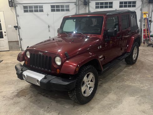 Used 2008 Jeep Wrangler Unlimited Sahara w/ Dual Top Group AWD/4WD image 1