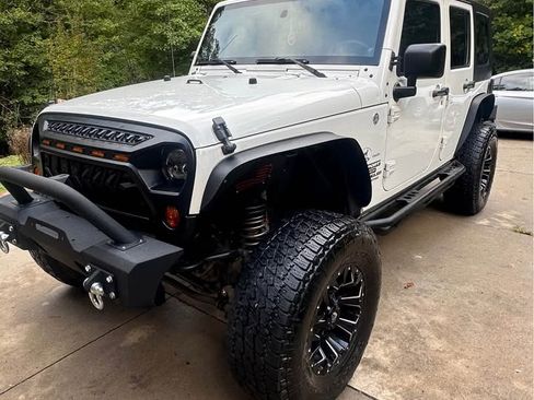 Used 2010 Jeep Wrangler Unlimited Sport image 1