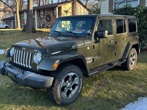 Used 2016 Jeep Wrangler Unlimited Sahara w/ Dual Top Group image 1