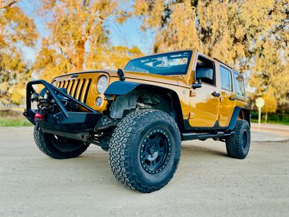 Used 2014 Jeep Wrangler Unlimited Sport