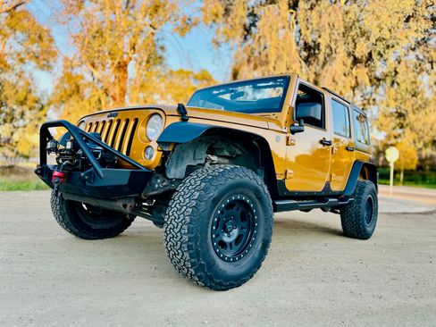 Used 2014 Jeep Wrangler Unlimited Sport AWD/4WD image 1