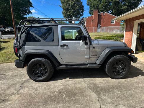 Used 2016 Jeep Wrangler Sport image 1