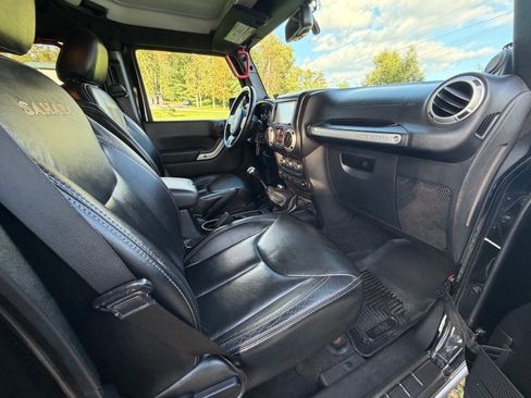 Used 2013 Jeep Wrangler Unlimited Sahara w/ Dual Top Group AWD/4WD image 14