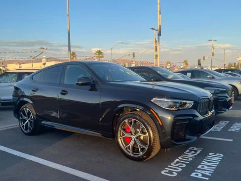 Used 2022 BMW X6 M50i w/ Executive Package image 1