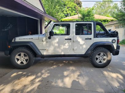 Used 2011 Jeep Wrangler Unlimited Rubicon w/ Dual Top Group