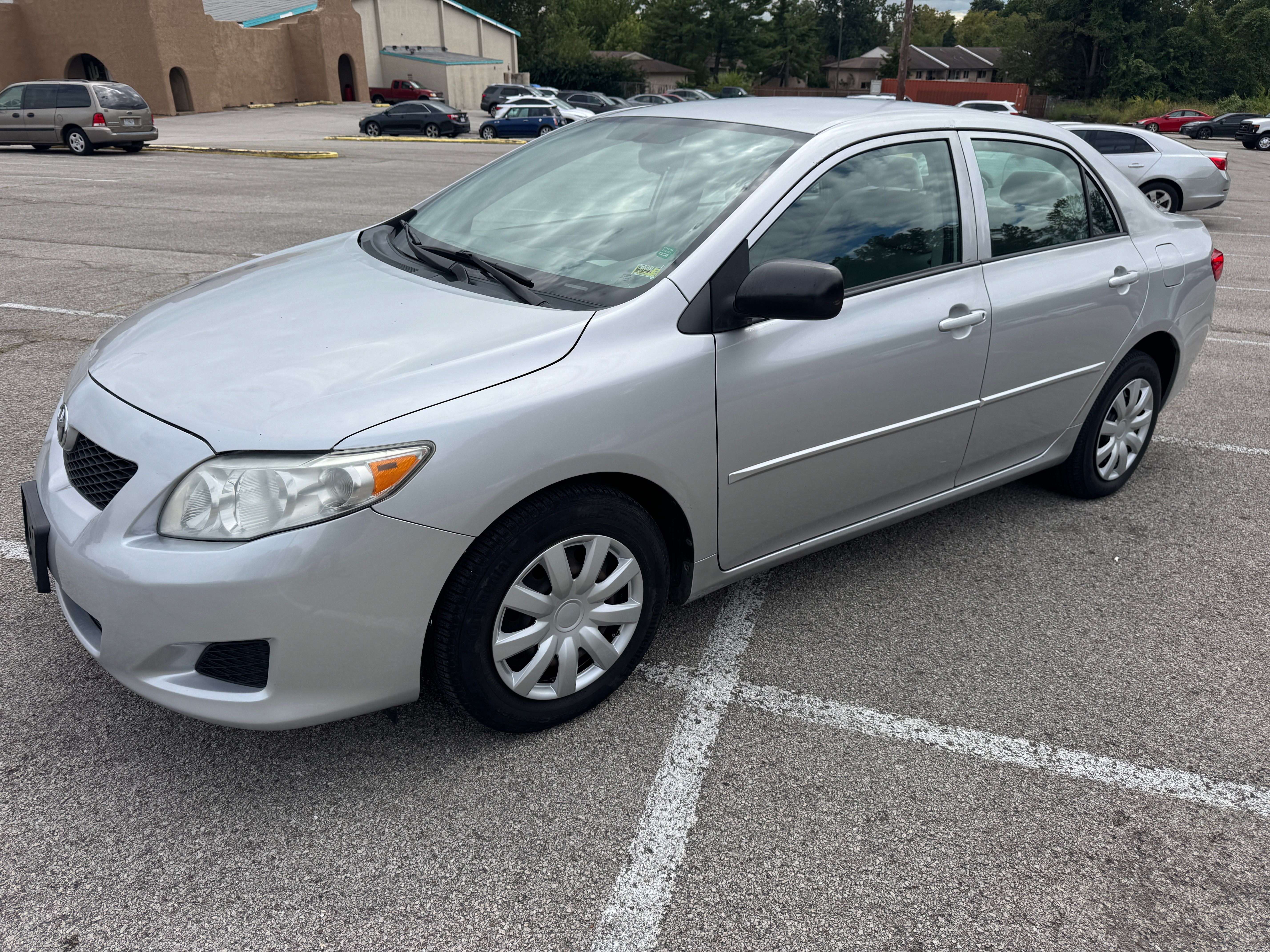 Used 2010 Toyota Corolla LE w/ All Weather Guard Pkg FWD image 1