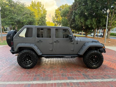 Used 2013 Jeep Wrangler Unlimited Sport AWD/4WD image 2