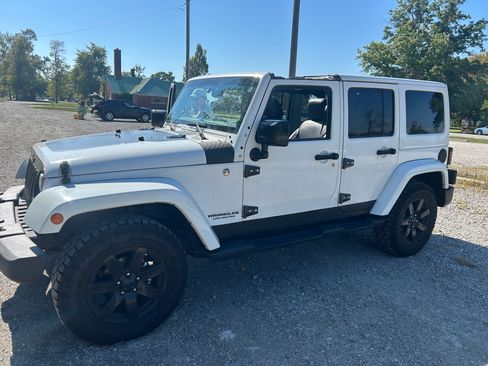 Used 2014 Jeep Wrangler Unlimited Sahara w/ Dual Top Group image 2