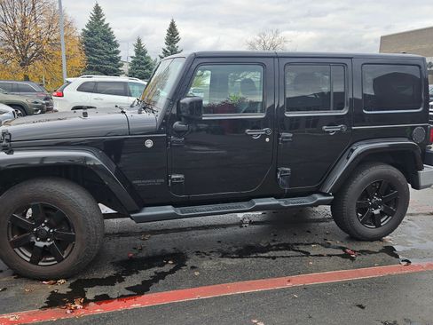 Used 2014 Jeep Wrangler Unlimited Sahara image 1