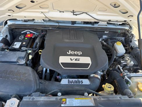 Used 2012 Jeep Wrangler Unlimited Sport w/ Black Appearance Group image 17