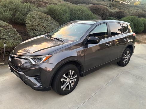 Used 2018 Toyota RAV4 LE w/ Carpet Mat Package image 1