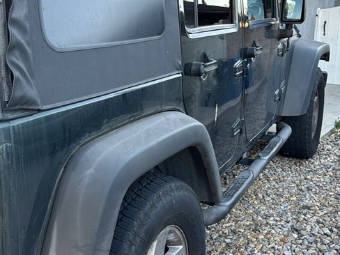 Used 2011 Jeep Wrangler Unlimited Sport image 1