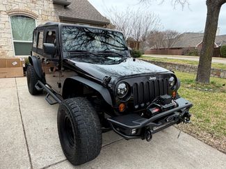 Used 2010 Jeep Wrangler Unlimited Sport AWD/4WD video 1