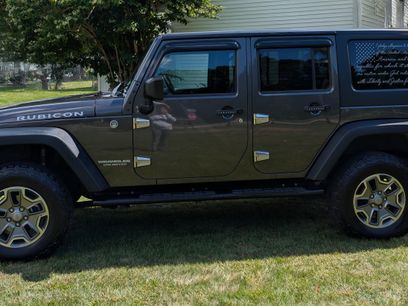 Used 2014 Jeep Wrangler Unlimited Rubicon w/ Dual Top Group