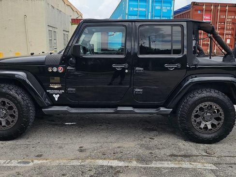 Used 2013 Jeep Wrangler Unlimited Sahara w/ Connectivity Group AWD/4WD image 2