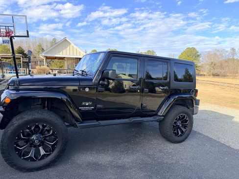 Used 2016 Jeep Wrangler Unlimited Sahara w/ Dual Top Group image 1