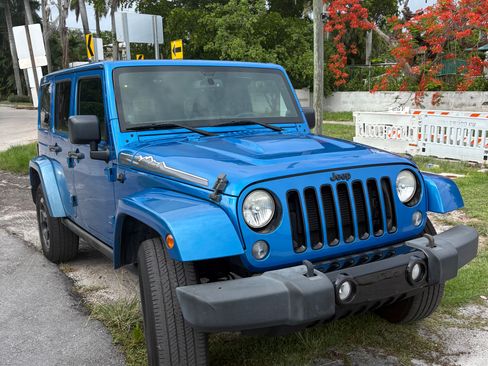 Used 2014 Jeep Wrangler Unlimited Sahara AWD/4WD image 1