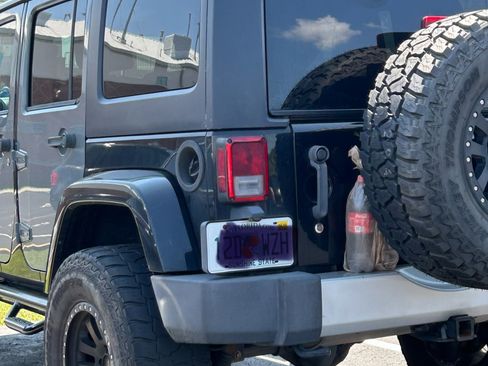 Used 2014 Jeep Wrangler Unlimited Sahara w/ Max Tow Package AWD/4WD image 9