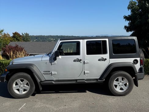 Used 2011 Jeep Wrangler Unlimited Sport w/ Dual Top Group image 1