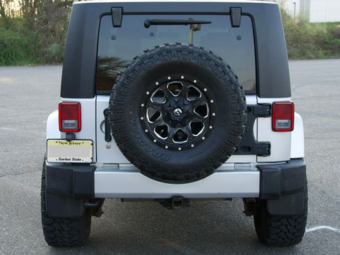 Used 2010 Jeep Wrangler Unlimited Sahara w/ Dual Top Group image 8