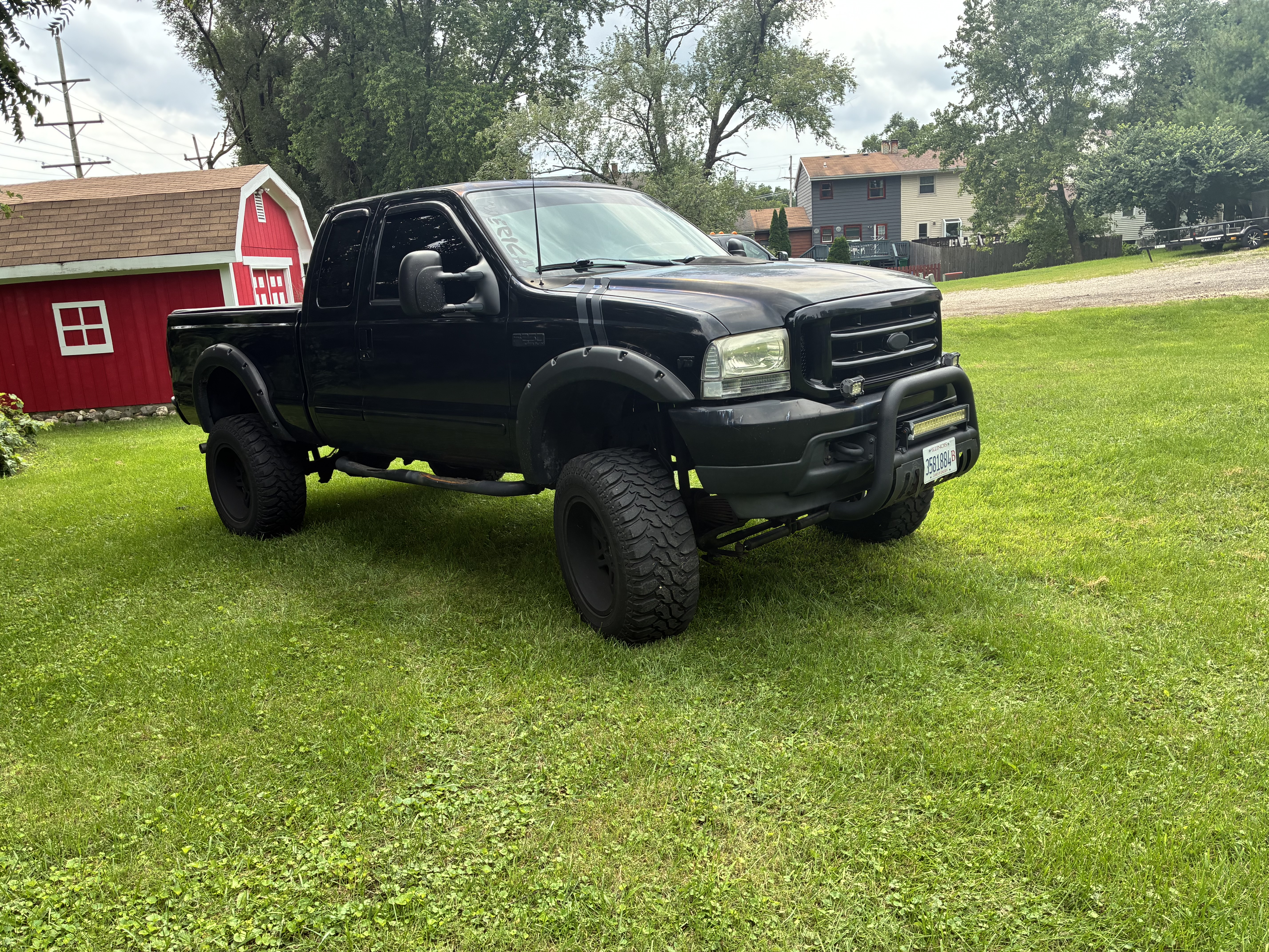 Used 2002 Ford F250 4x4 SuperCab Super Duty image 1