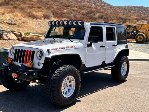 Used 2016 Jeep Wrangler Unlimited Sahara w/ Max Tow Package image 1