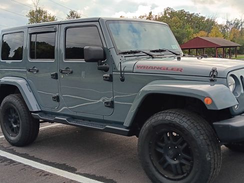 Used 2014 Jeep Wrangler Unlimited Sahara w/ Connectivity Group image 1