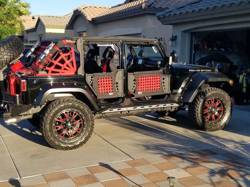 Used 2012 Jeep Wrangler Unlimited Sport image 1