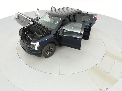 Used 2023 Ford F150 Lightning XLT w/ Equipment Group 312A High image 1